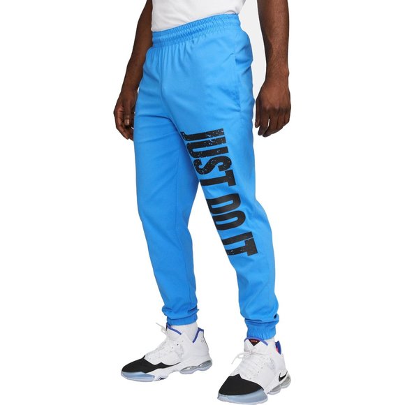 NWT NIKE MEN'S WOVEN LOGO JUST DO IT JOGGER SWEATPANTS‎ CAROLINA BLUE BLACK - Picture 1 of 7